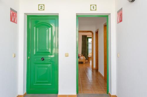 Apartamentos Los Quiqueres Πουέρτο Ντελ Κάρμεν Εξωτερικό φωτογραφία